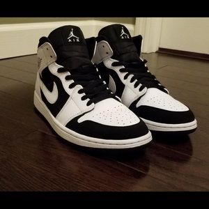 black and white Jordan 1 mid